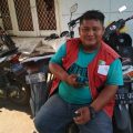 Hendri, Petugas Parkir Peserta BPJS Kesehatan.
