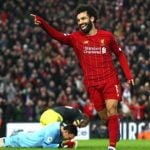 Striker Liverpool, Mohammed Salah saat merayakan gol keduanya ke gawang Southampton.