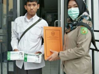 Pemko Medan membagikan sebanyak 10.500 masker ke 21 kecamatan secara gratis, Senin (23/3/2020).
