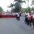 Plt Kepala Dinas Kepemudaan Olahraga dan Pariwisata Asahan, Buwono Prawana saat memeriahkan Hari Jadi Asahan ke-74 di Alun -alun Rambate Rata Raya, Kisaran, Minggu (15/3/2020).