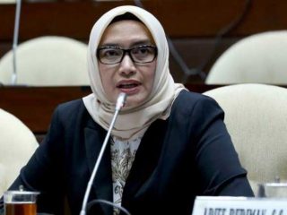 Evi Novida Ginting Manik