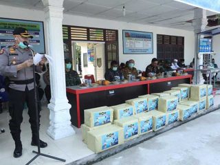 Kompol Muhammad Ikhwan di Halaman Kantor Camat Kecamatan Kota Kisaran Barat.