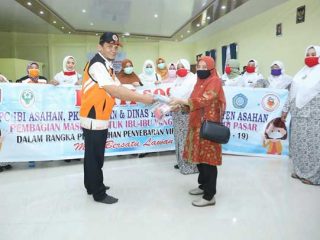 TP PKK Bersama IBI Dan Dinkes Asahan Bagikan 1000 Masker