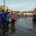 Kondisi jalan menuju Pasar Marelan berkubang