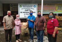 Pengurus DPD KNPI Sumatera Utara lakukan Bakti Sosial berupa pembagian masker di SD Negeri 060809.