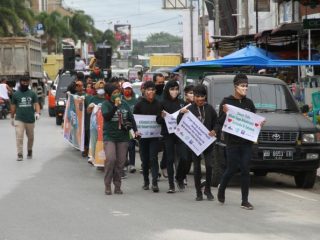 BPODT bersama Komunitas Gerakan Toba Bersih mengkampanyekan penerapan protokol kesehatan di masa AKB setelah terjadinya pandemi.