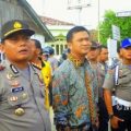 Kombes Pol John CE Nababan (kiri) saat menjabat Kapolres Nias Selatan dengan pangkat Ajun Komisaris Besar Polisi. (int)