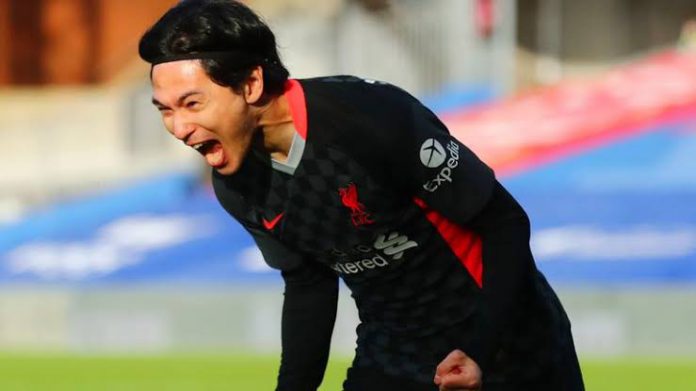 Ekspresi Takumi Minamino usai mencetak gol ke gawang Crystal Palace.(skysport)