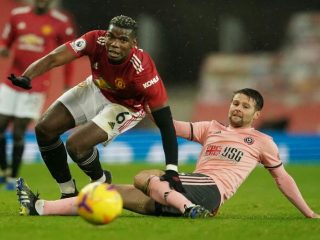 Manchester United gagal mengkudeta puncak klasmen EPL sementara dari saudara sekotanya Manchester City setelah dipermalukan tamunya Sheffield United 1-2 di Old Trafford