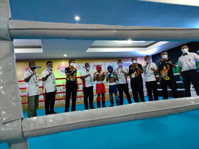Ketua Umum Komite Olahraga Nasional Indonesia (KONI) Pusat, Marciano Norman membuka secara resmi eksebisi kickboxing Pekan Olahraga Nasional (PON) XX Papua 2020 yang digelar di Aula  Asrama Haji Jayapura, Papua, Rabu (22/9/2021) kemarin.