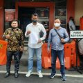 Saktiawan Sinaga (tengah) didampingi kuasa hukumnya, Chandra P Naibaho dan Wandi Budi Wijaya usai membuat laporan di Polrestabes Medan, Kamis (9/12/2021).