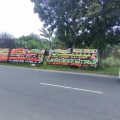 Sejumlah karangan bunga terpasang di sepanjang Jalan Lintas Medan - Langkat