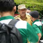 Plt Bupati Langkat, Syah Afandin Lepas Sambut Mahasiswa KKN USU di Halaman Kantor Bupati Langkat, Senin (21/3/2022)