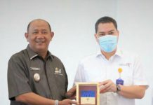 Plt Bupati Langkat, Syah Afandin bersama Direktur Politeknik Pariwisata Medan, Anwari Masatip