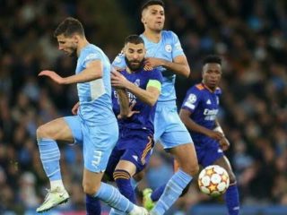 Manchester City menang tipis 4-3 kala bersua Real Madrid di babak semifinal leg pertama Liga Champions 2021/2022, Rabu (27/4/2022).