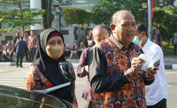 Plt Bupati Langkat, Syah Afandin bersama istri menghadiri Peringatan Harganas di Lapangan Merdeka Medan, Kamis (7/7/2022)