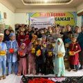 Manajemen Vasaka Reiz Condo berfoto bersama dengan anak anak dari Panti Asuhan Al Marhamah