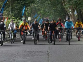 Plt Bupati Langkat, Syah Afandin bersama Pengurus FKPPI Langkat gowes bersama