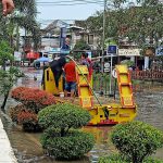 Kawasan Perumahan Taman Setia Budi Indah (Tasbih) 2, Kecamatan Medan Selayang tergenang air akibat meluapnya Sungai Sei Kambing, Senin (20/3/2023).