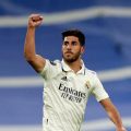 Pemain Real Madrid, Asensio merayakan golnya ke gawang Chelsea di babak 8 besar Liga Champions ketika kedua tim bertanding di Stadion Santiago Bernabeu, Kamis (14/4/2023). Madrid menang 2-0. Foto:Reuters