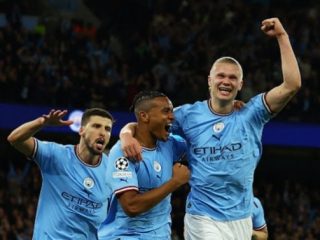 Pemain Man City merayakan gol kemenangan ke gawang Real Madrid di Stadion Etihad, Kamis (18/5/2023). Foto:Reuters