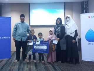 Karyawan XL Axiata Santuni Anak Yatim Duafa di Medan