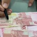 Viral di media sosial soal beredarnya uang mutilasi. Dalam video tersebut, menunjukkan beberapa lembar uang rupiah pecahan Rp 100.000 dengan nomor seri berbeda di kedua sisi.