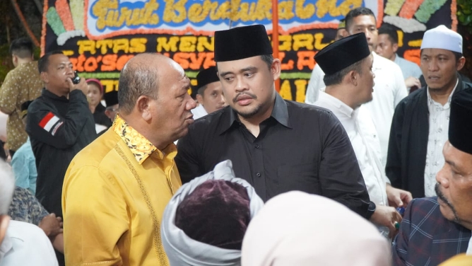 Plt Bupati Langkat, Syah Afandin bersama Walikota Medan, Bobby Nasution