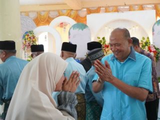 Plt Bupati Langkat, Syah Afandin saat menghadiri kegiatan nikah massal