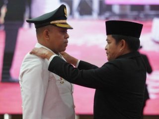 Pj Gubsu, Hassanudin saat melantik Pj Bupati Langkat