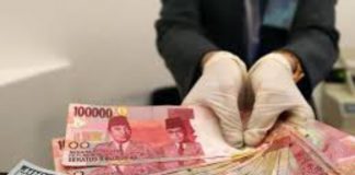Rupiah terdepresiasi terhadap dolar Amerika Serikat (AS) pasca kejutan Bank Indonesia (BI) disampaikan perihal suku bunga yang di luar ekspektasi pasar.