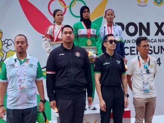 Pelari Sumatera Utara Nella Agustin sukses mempersembahkan medali emas dari nomor 200 meter lari putri PON XXI Aceh - Sumut 2024. Pelari asal Serdang Bedagai ini juga memecahkan rekor nasional atas namanya sendiri.