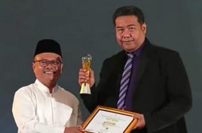 Wahdi Azmi meraih Public Service (Non-Government) Award dalam PDHI Awards 2025 yang digelar di Hotel Merlyn Park, Jakarta, Sabtu (11/1/2025) malam.