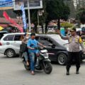 Personel Polda Sumut meningkatkan pengamanan di jalur wisata utama menuju Berastagi dan Danau Toba selama libur Lebaran 2025.
