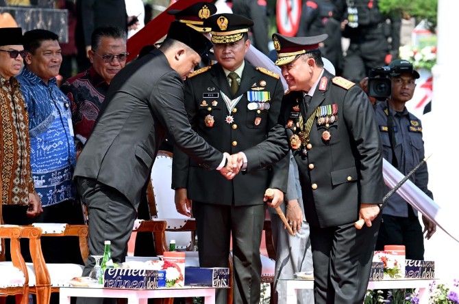 Upacara Hari Peringatan HUT ke-79 Bhayangkara di Lapangan KS Tubun Mapolda Sumut, Jalan Sisingamangaraja, Medan, Selasa (1/7/2025).