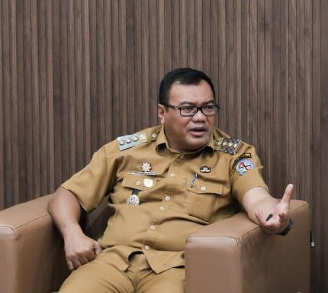 Bupati Deli Serdang dr H Asri Ludin Tambunan