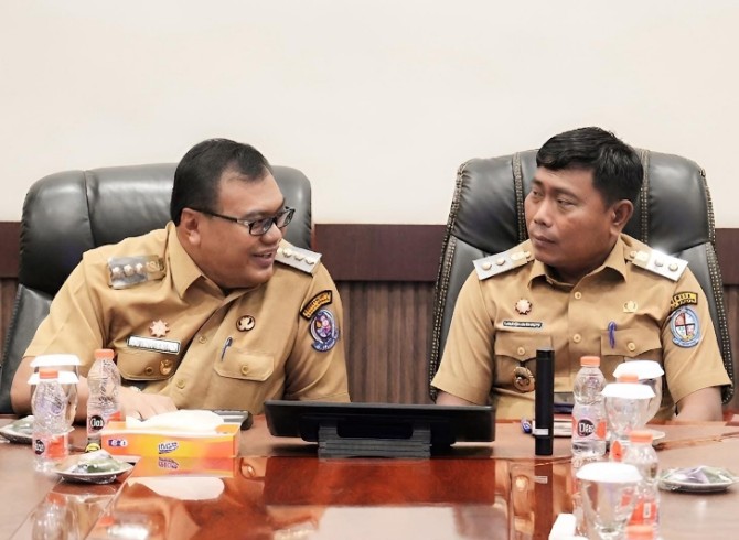 Bupati Deliserdang, Asri Ludin Tambunan bersama Wakil Bupati Deliserdang, Lom Lom Suwondo