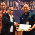 Asisten Deputi Ekosistem Bisnis Wirausaha Kementerian UMKM, Ginda P. Siregar, saat membuka kegiatan Peningkatan Kapasitas Usaha bagi Wirausaha Terdampak Bencana Regional 1 Sumatera Utara di Hotel Grand Antares, Medan, Jumat (23/10/2026).