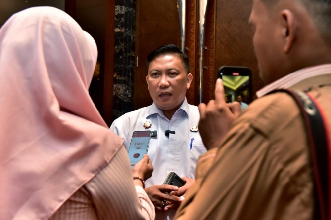 Erwin Hotmansah Harahap